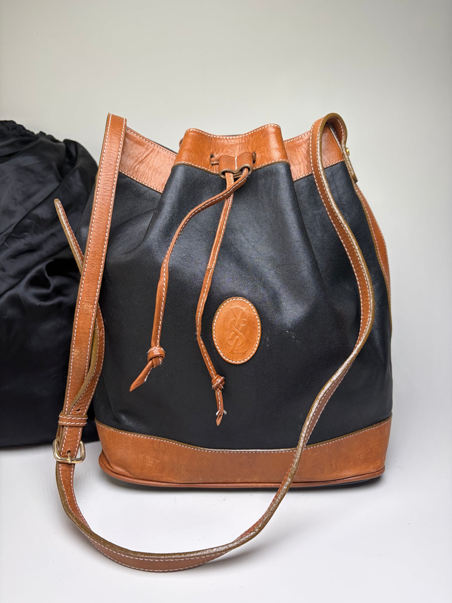 Vintage Yves Saint Laurent Monogram Leather Bucket Bag Black Tan