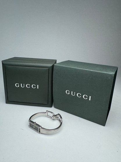 Montre Gucci vintage en acier avec mors argenté