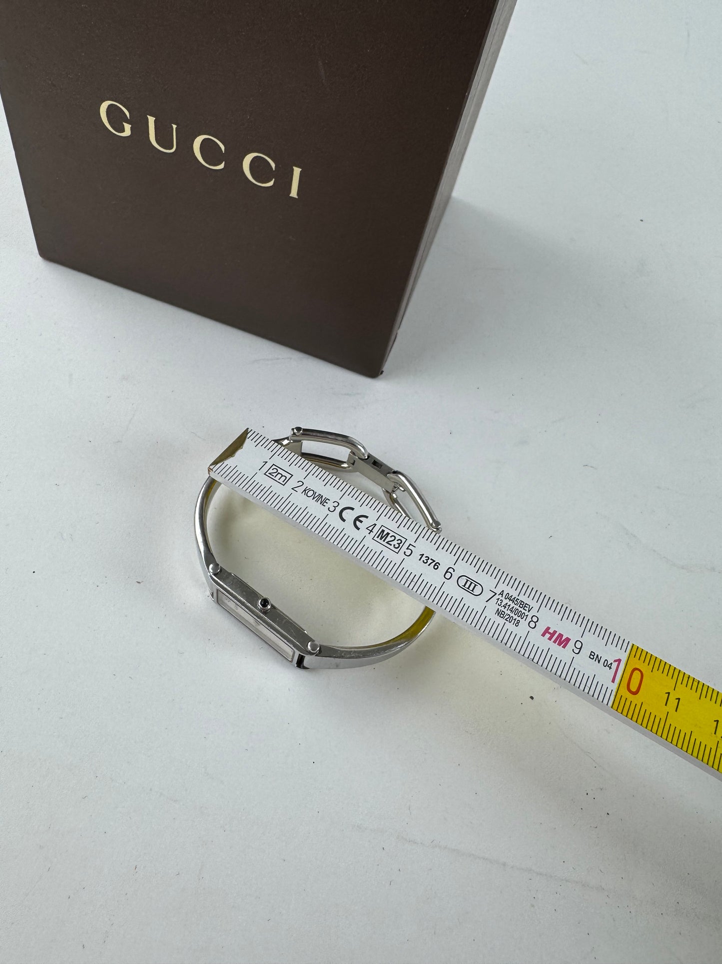 Montre Gucci vintage en acier avec mors argenté