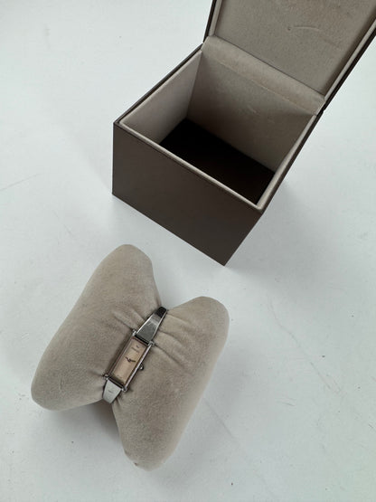 Montre Gucci vintage en acier avec mors argenté