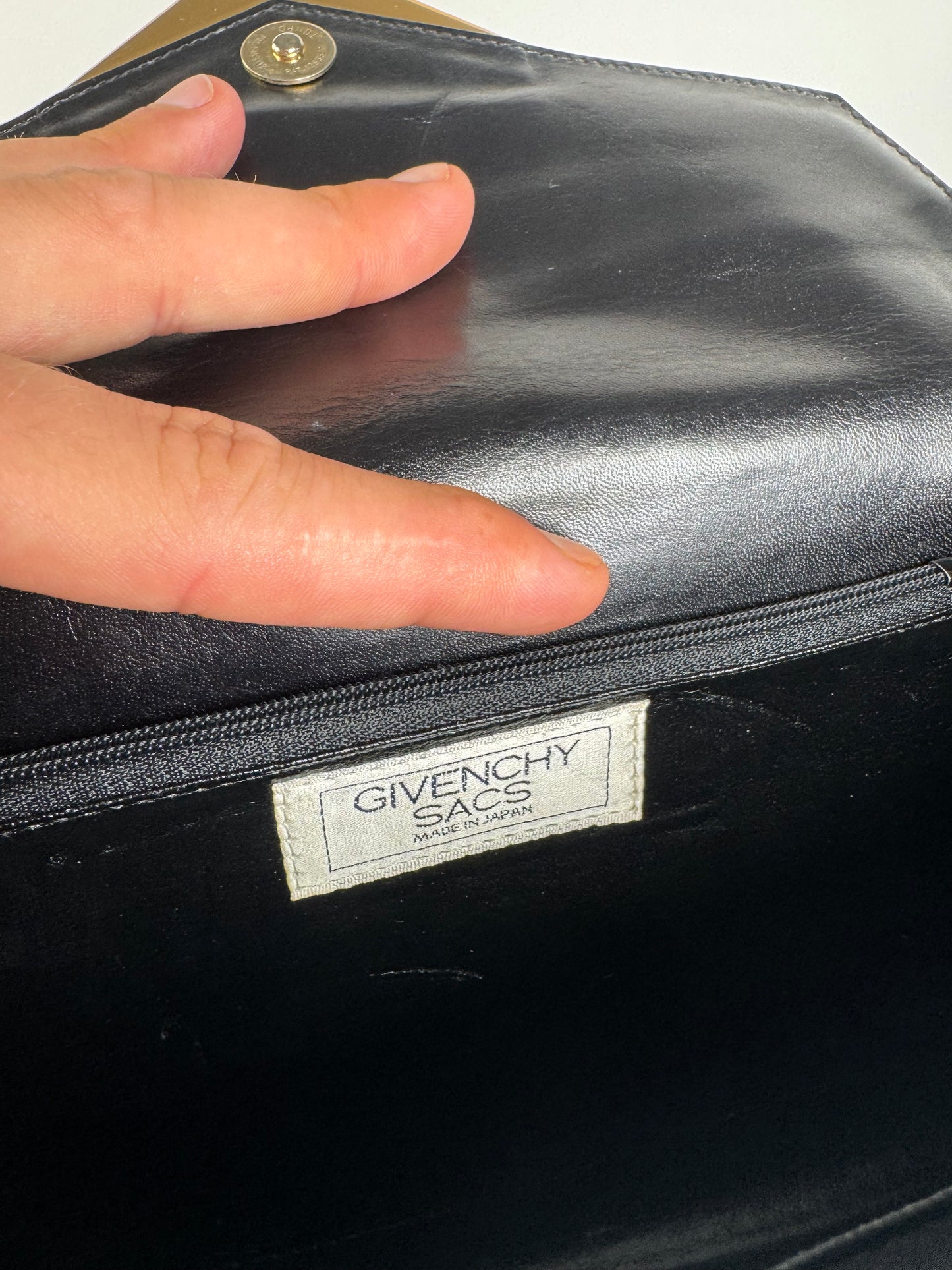 Sac vintage Givenchy en cuir noir à double sens