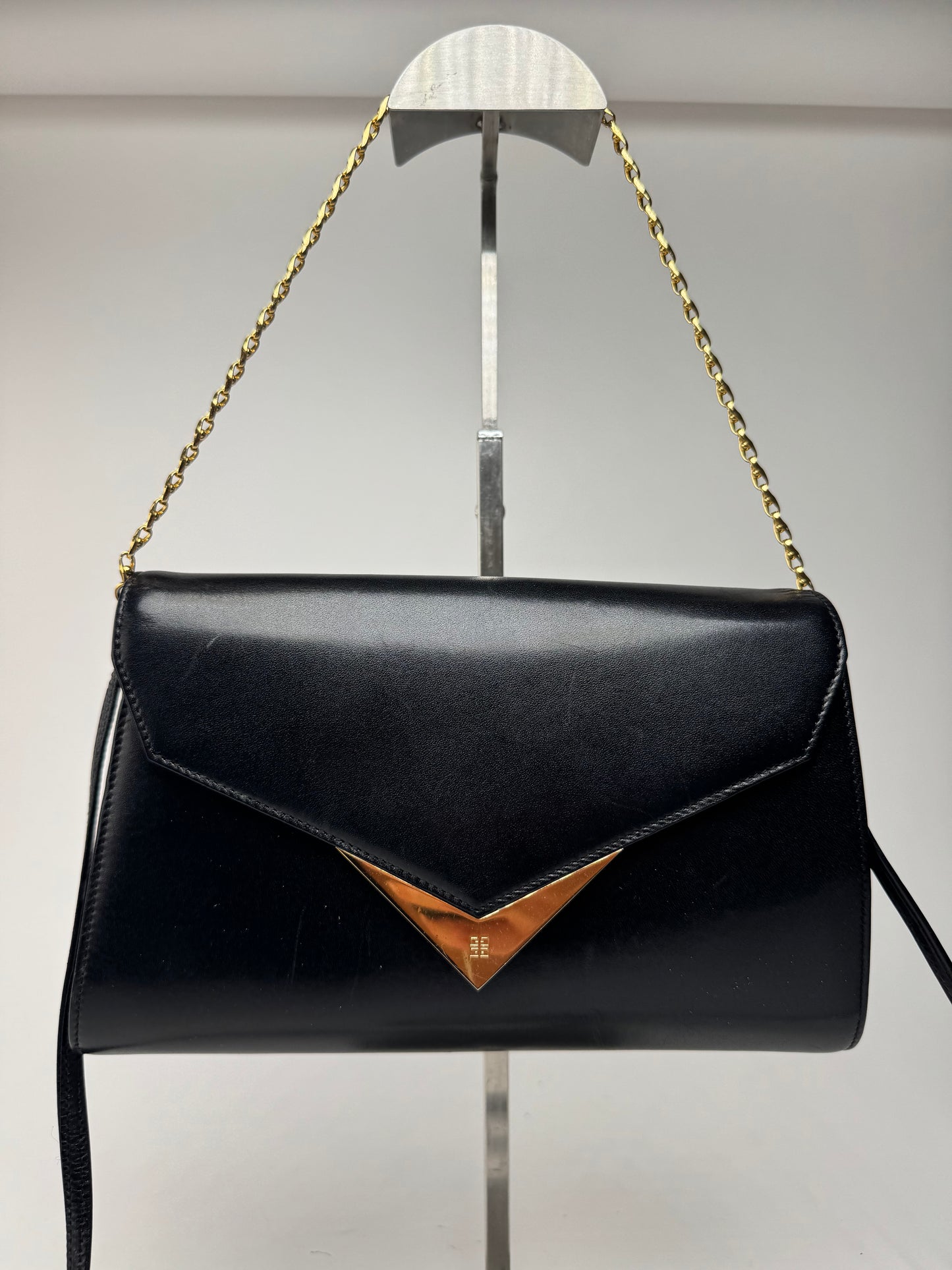 Sac vintage Givenchy en cuir noir à double sens
