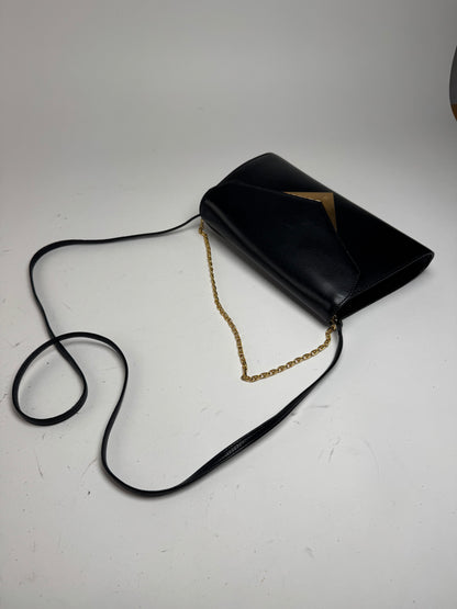 Sac vintage Givenchy en cuir noir à double sens