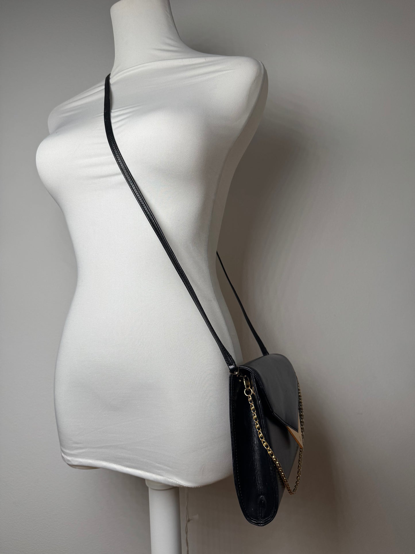 Sac vintage Givenchy en cuir noir à double sens