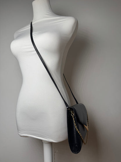 Sac vintage Givenchy en cuir noir à double sens