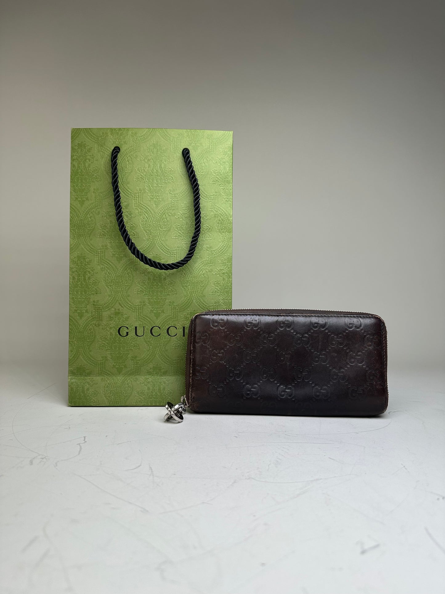 Vintage Gucci GG Embossed Leather Zip Wallet Brown