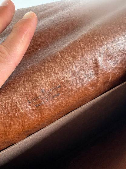 Vintage Louis Vuitton monogram leather clutch