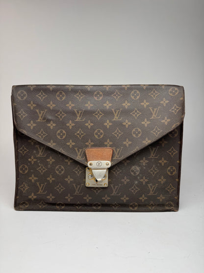 Vintage Louis Vuitton monogram leather clutch