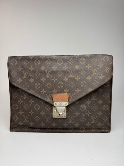 Vintage Louis Vuitton monogram leather clutch