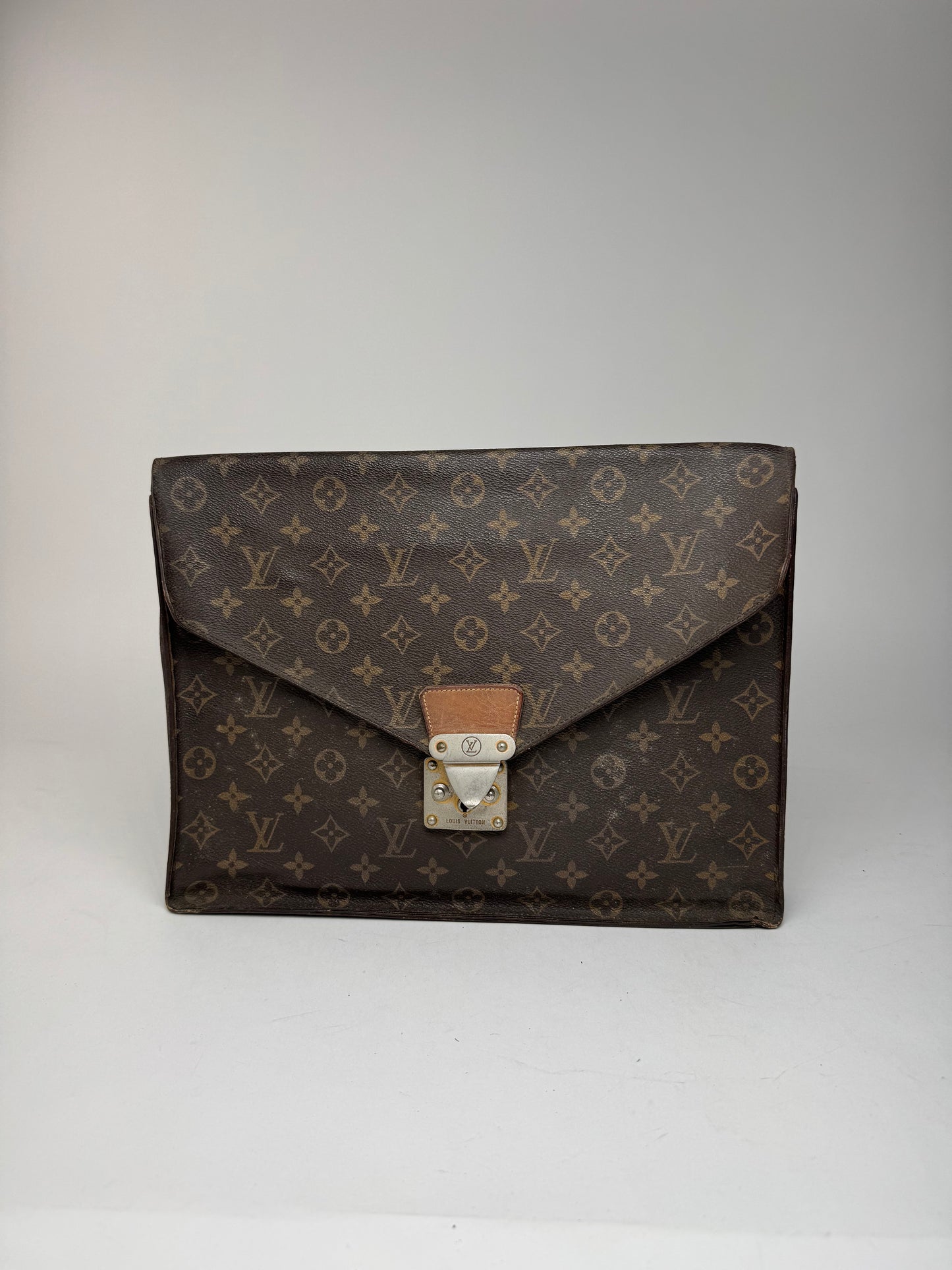 Vintage Louis Vuitton monogram leather clutch