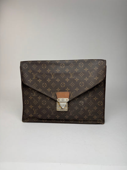 Vintage Louis Vuitton monogram leather clutch