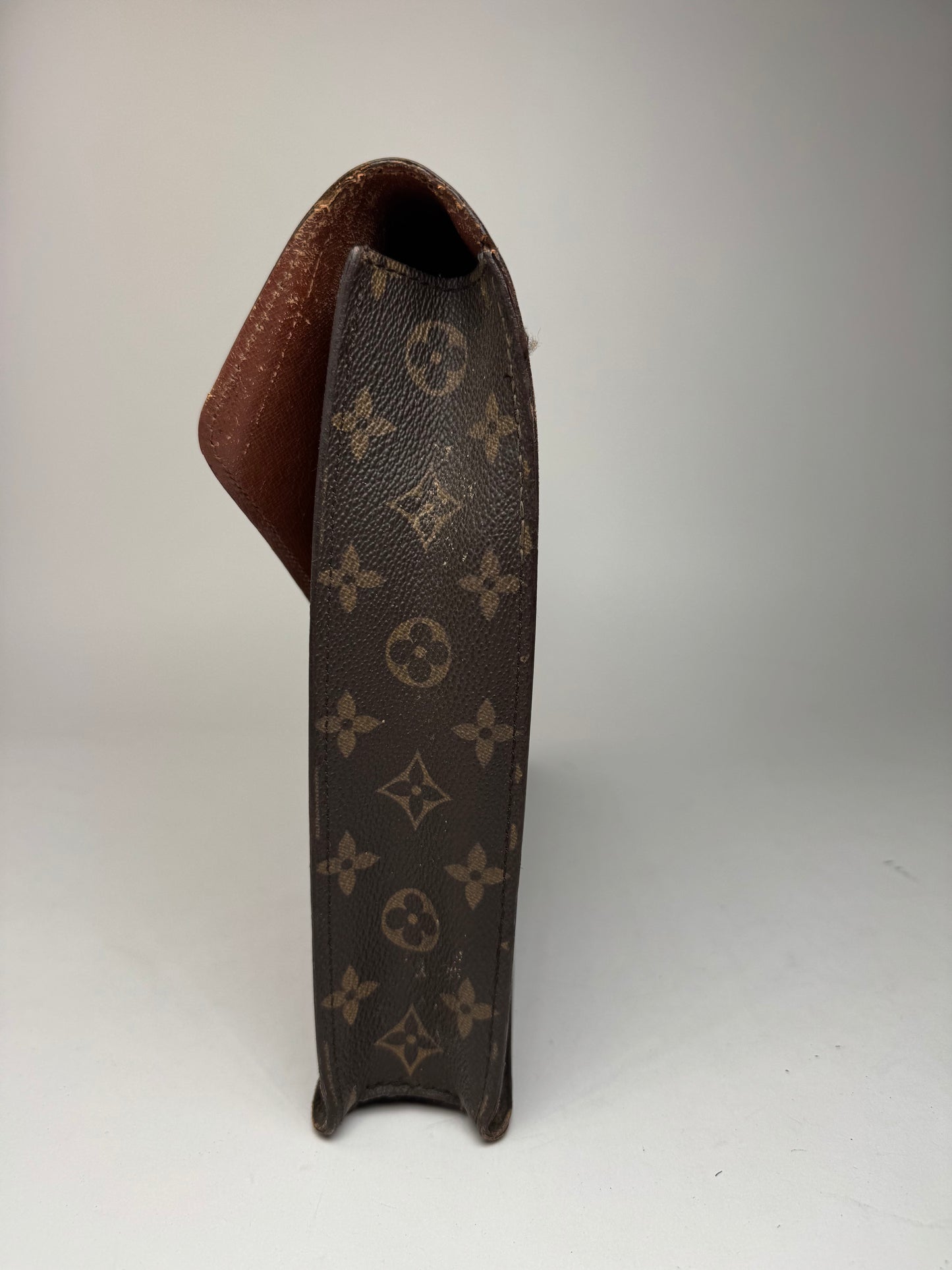 Vintage Louis Vuitton monogram leather clutch