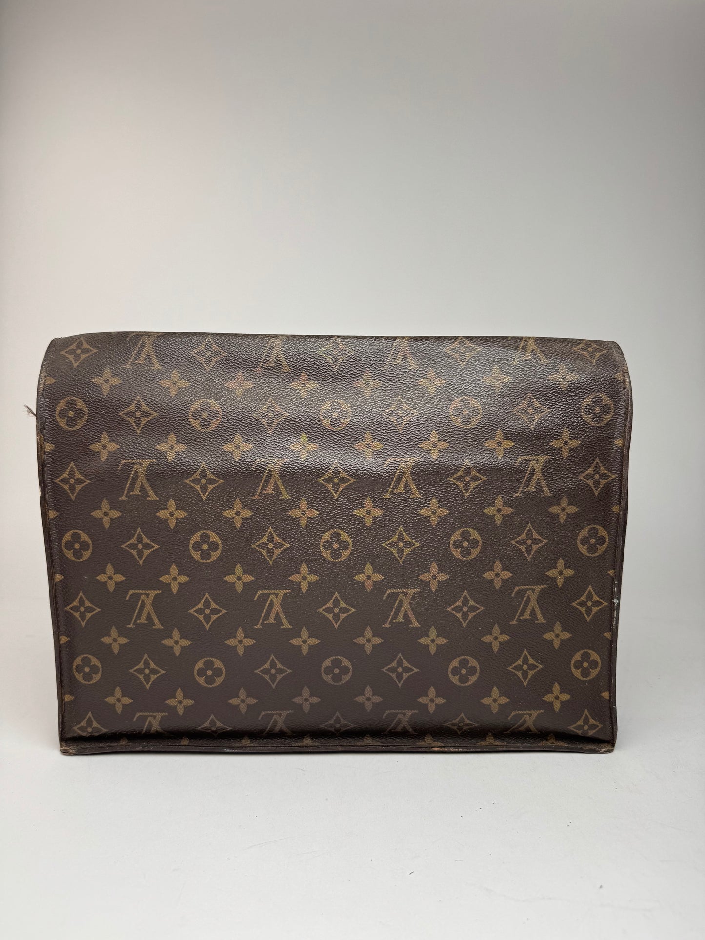 Vintage Louis Vuitton monogram leather clutch