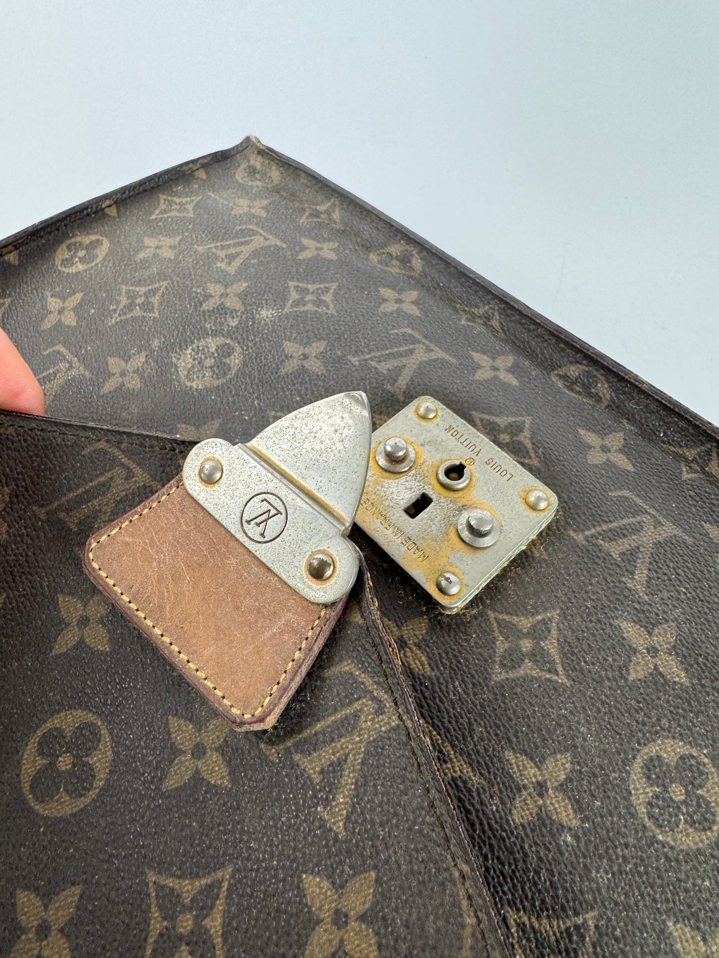 Vintage Louis Vuitton monogram leather clutch