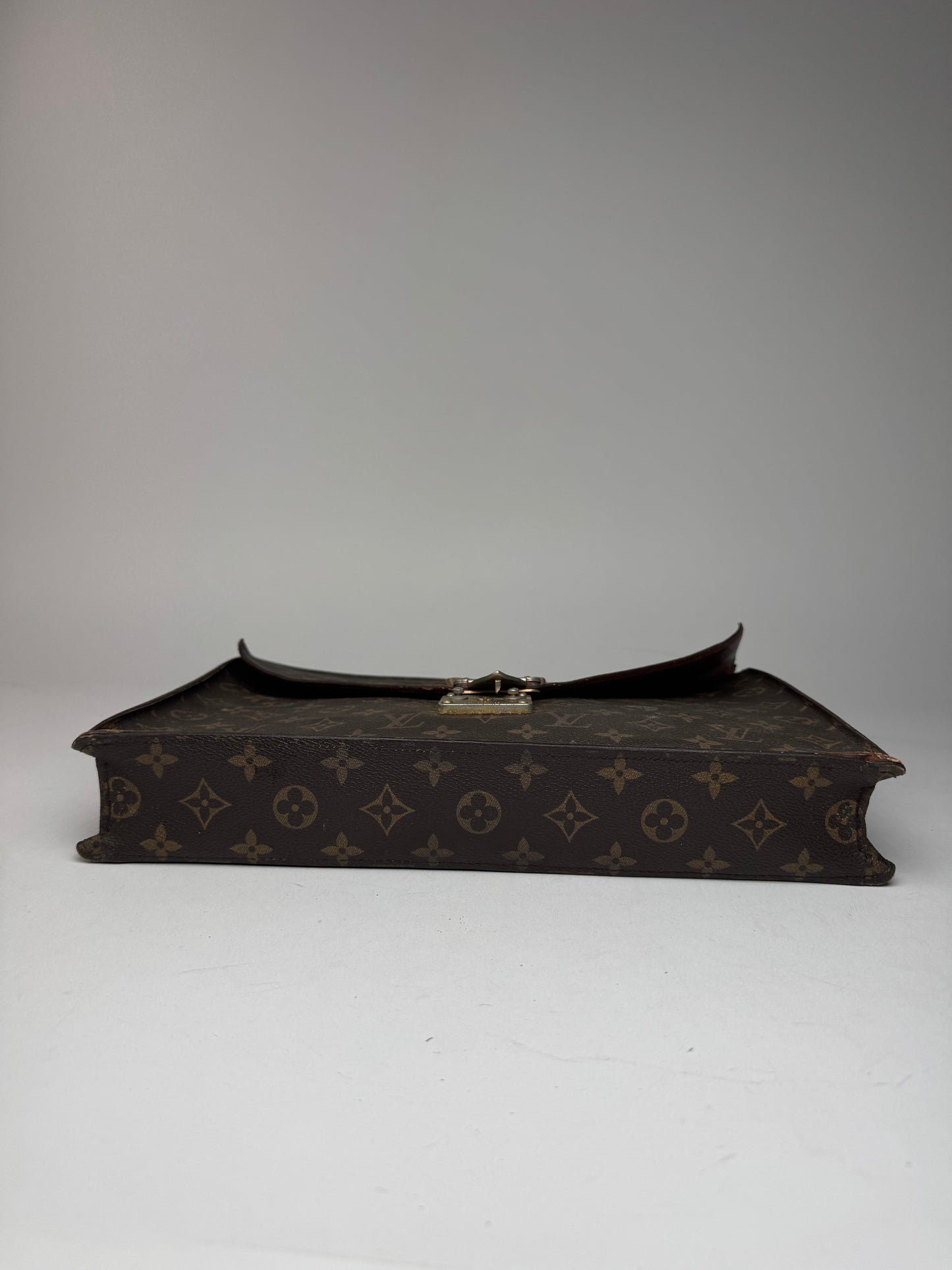 Vintage Louis Vuitton monogram leather clutch