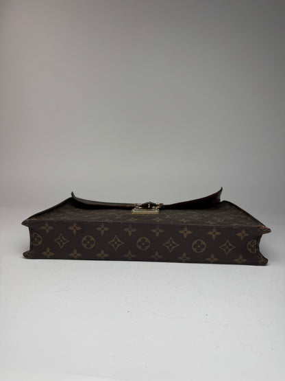 Vintage Louis Vuitton monogram leather clutch
