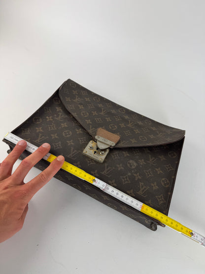 Vintage Louis Vuitton monogram leather clutch