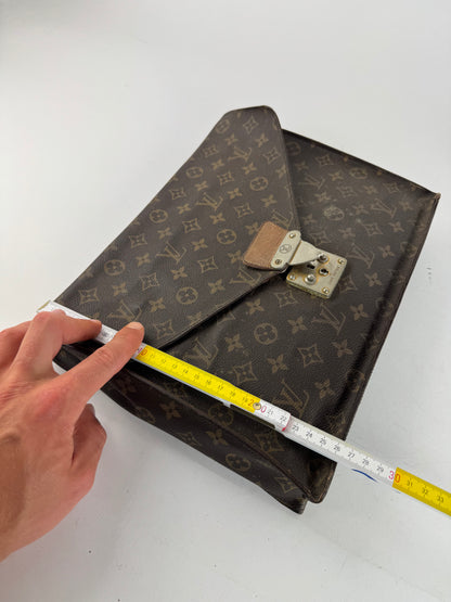 Vintage Louis Vuitton monogram leather clutch