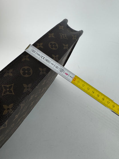 Vintage Louis Vuitton monogram leather clutch