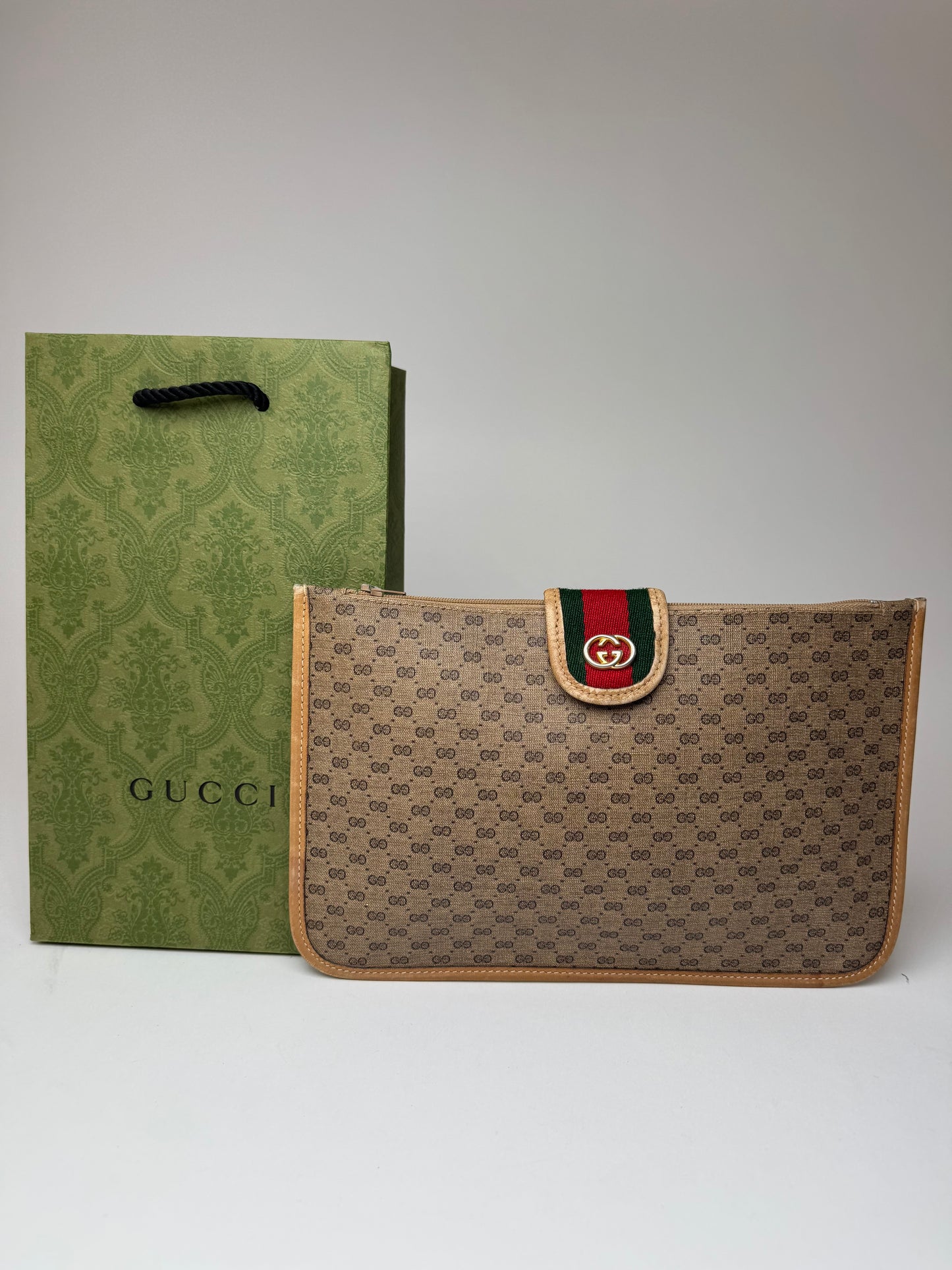 Vintage Gucci Monogram Canvas Leather Clutch Brown