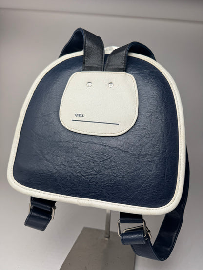 Sac à dos vintage Courreges Paris en cuir bleu marine et blanc