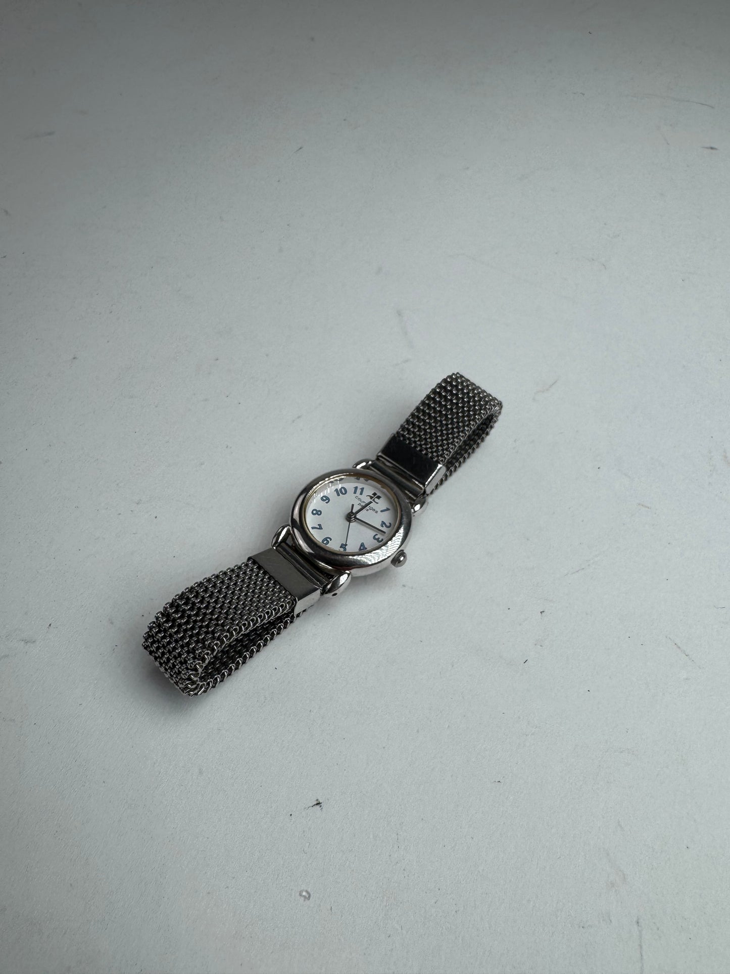 Montre à quartz vintage Courreges en métal argenté