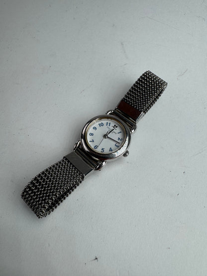 Montre à quartz vintage Courreges en métal argenté