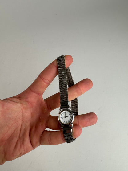 Montre à quartz vintage Courreges en métal argenté