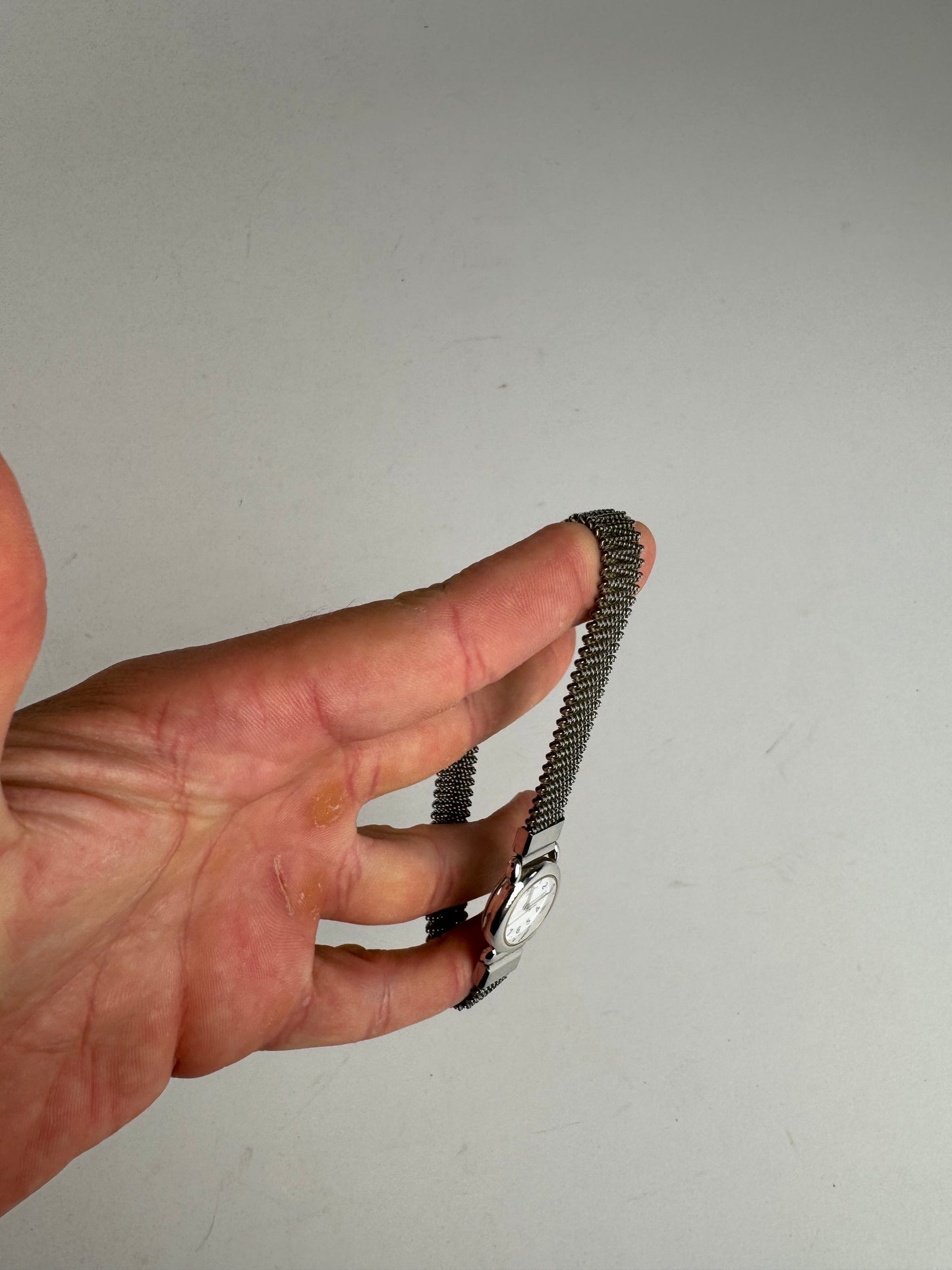 Montre à quartz vintage Courreges en métal argenté