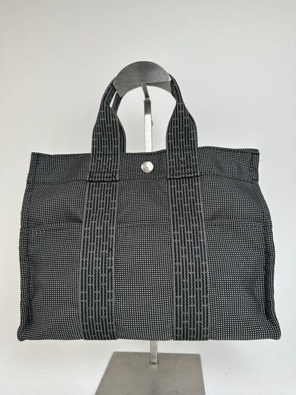 Hermès Black Canvas Tote Bag with Zip Closure and Snap Button