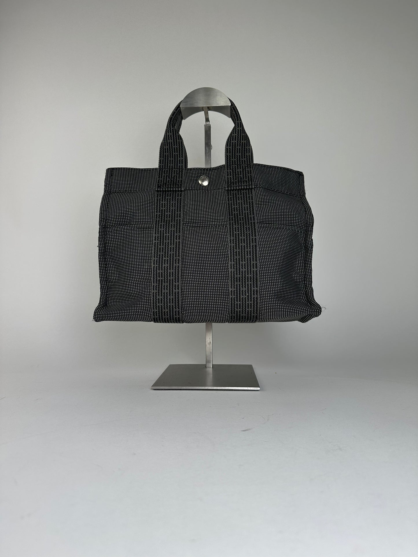 Hermès Black Canvas Tote Bag with Zip Closure and Snap Button