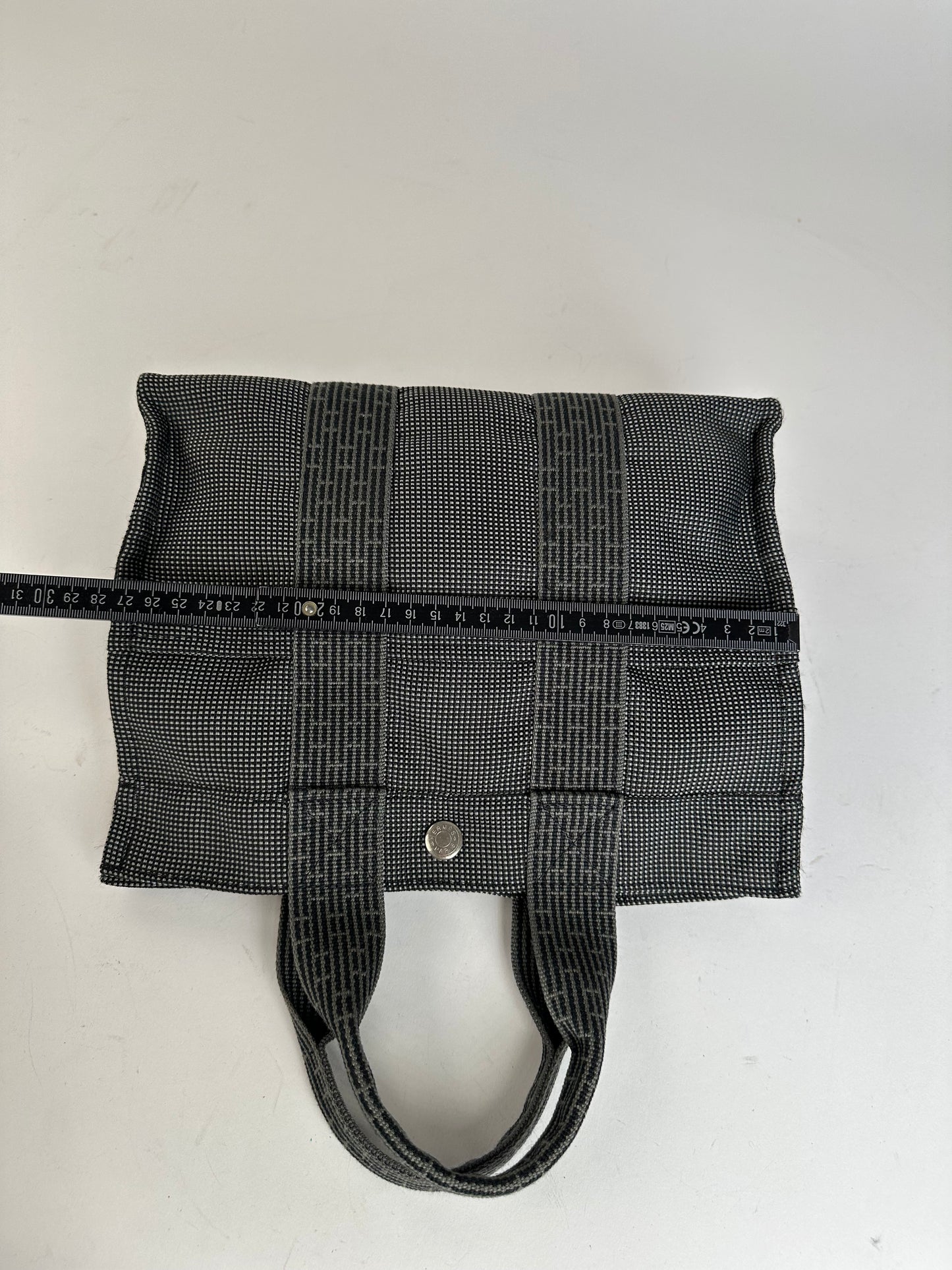 Hermès Black Canvas Tote Bag with Zip Closure and Snap Button