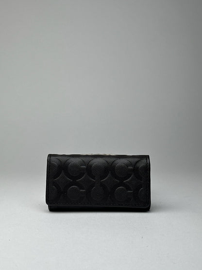 Porte-clés Coach vintage en cuir monogramme noir