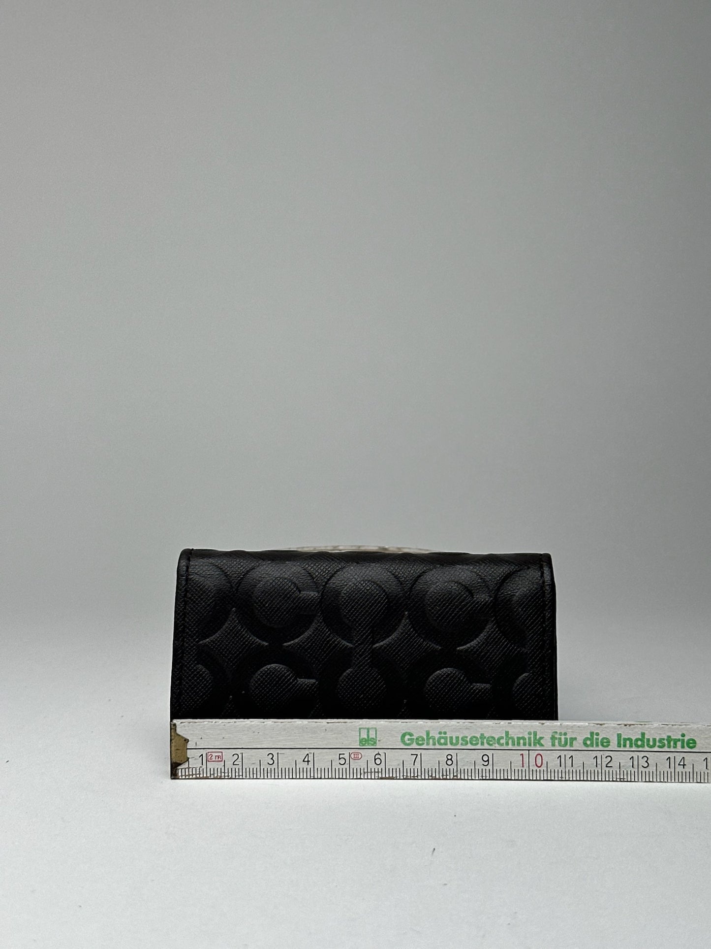 Porte-clés Coach vintage en cuir monogramme noir