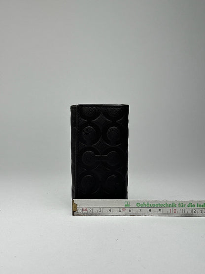 Porte-clés Coach vintage en cuir monogramme noir