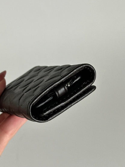 Porte-clés Coach vintage en cuir monogramme noir