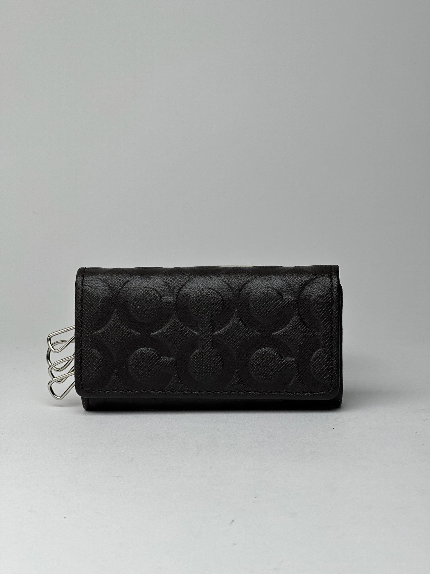 Porte-clés Coach vintage en cuir monogramme noir