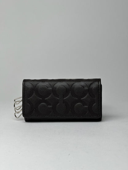 Porte-clés Coach vintage en cuir monogramme noir