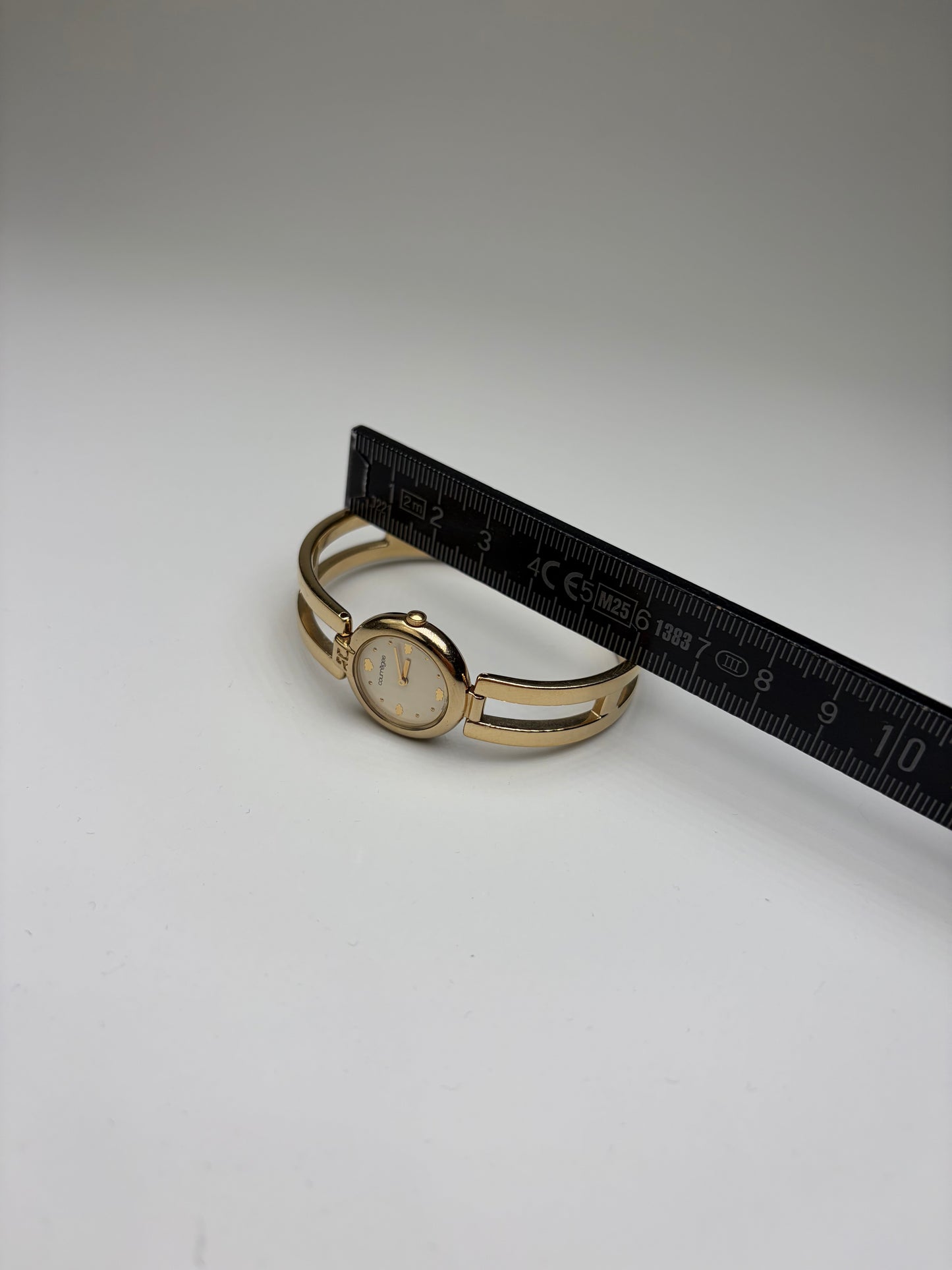 Vintage Courreges Gold-Tone Bangle Watch Cream Yellow Face