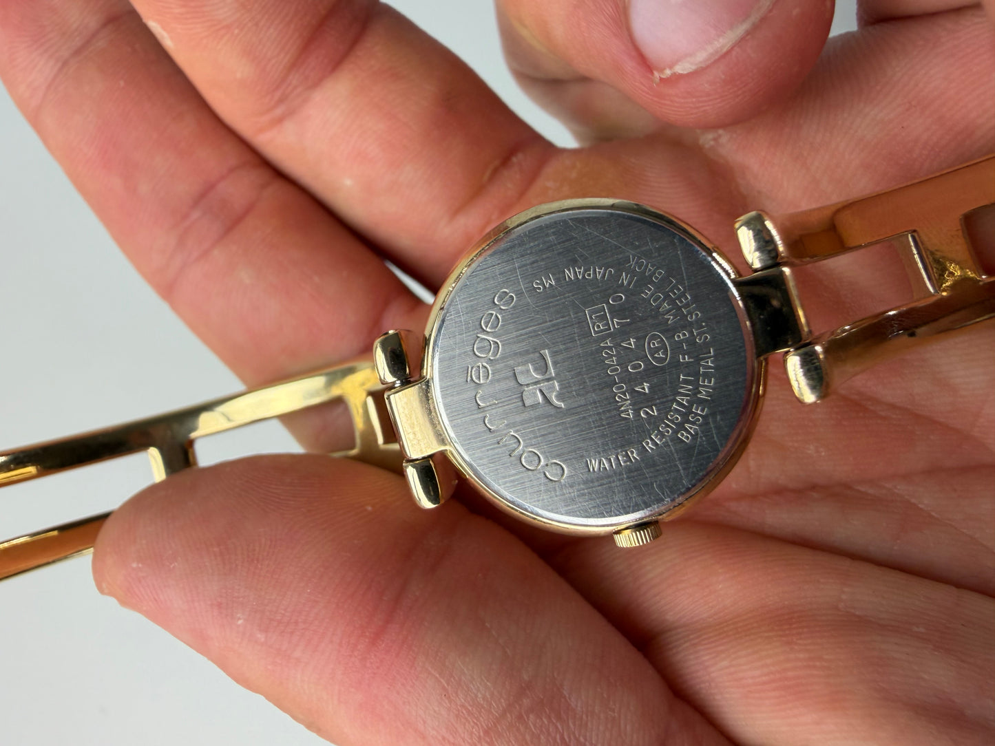 Vintage Courreges Gold-Tone Bangle Watch Cream Yellow Face