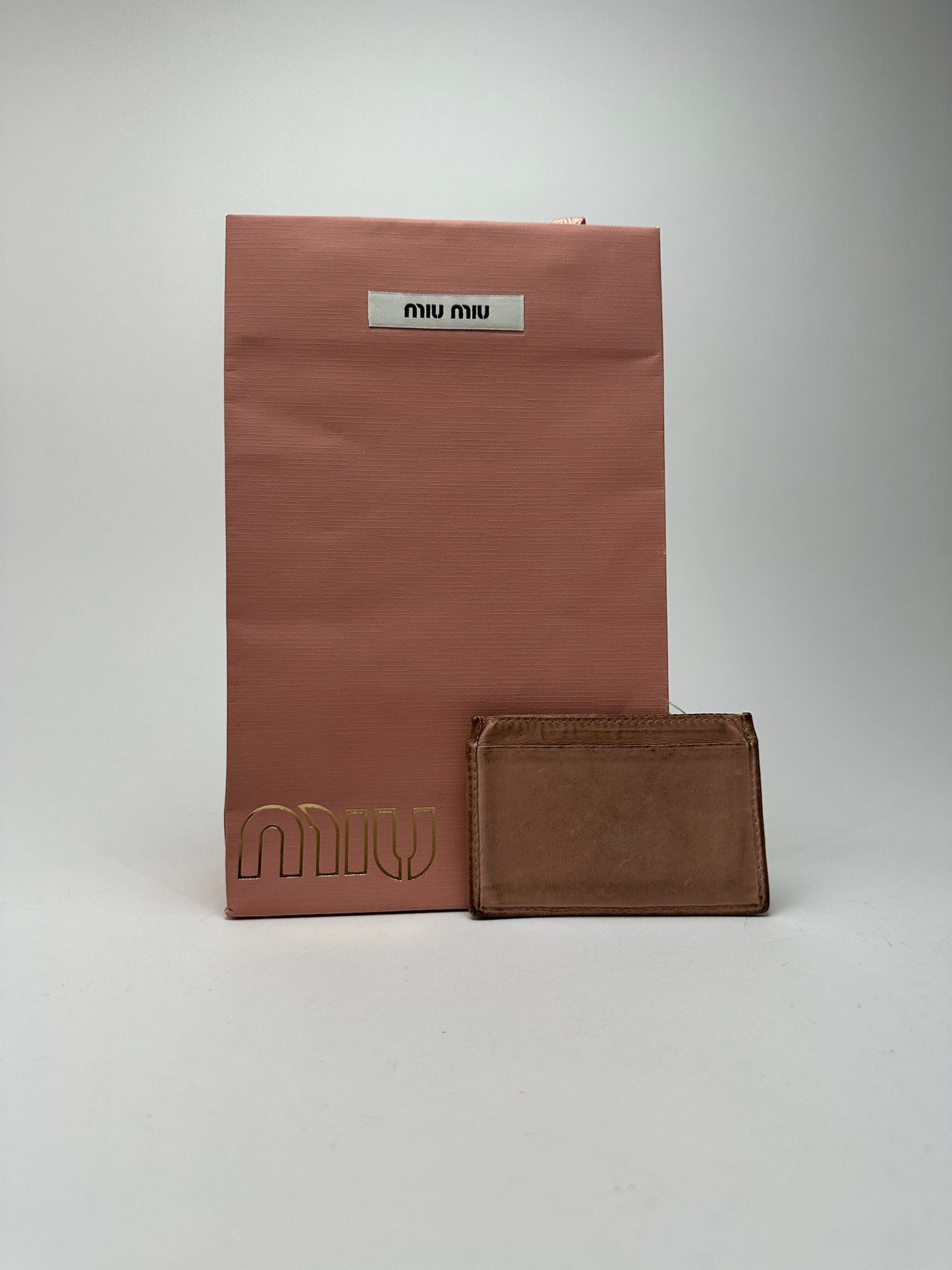 Porte-cartes vintage en cuir rose Miu Miu