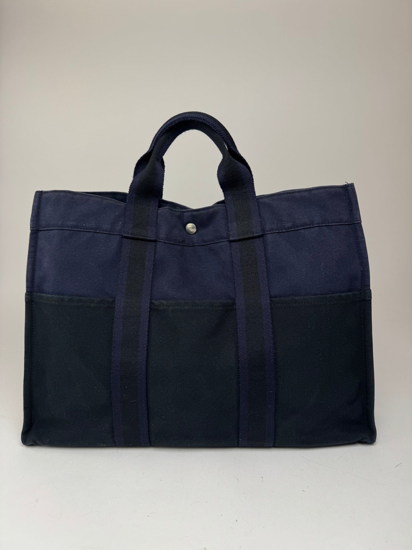Sac cabas vintage Hermès en toile bleu marine et noir