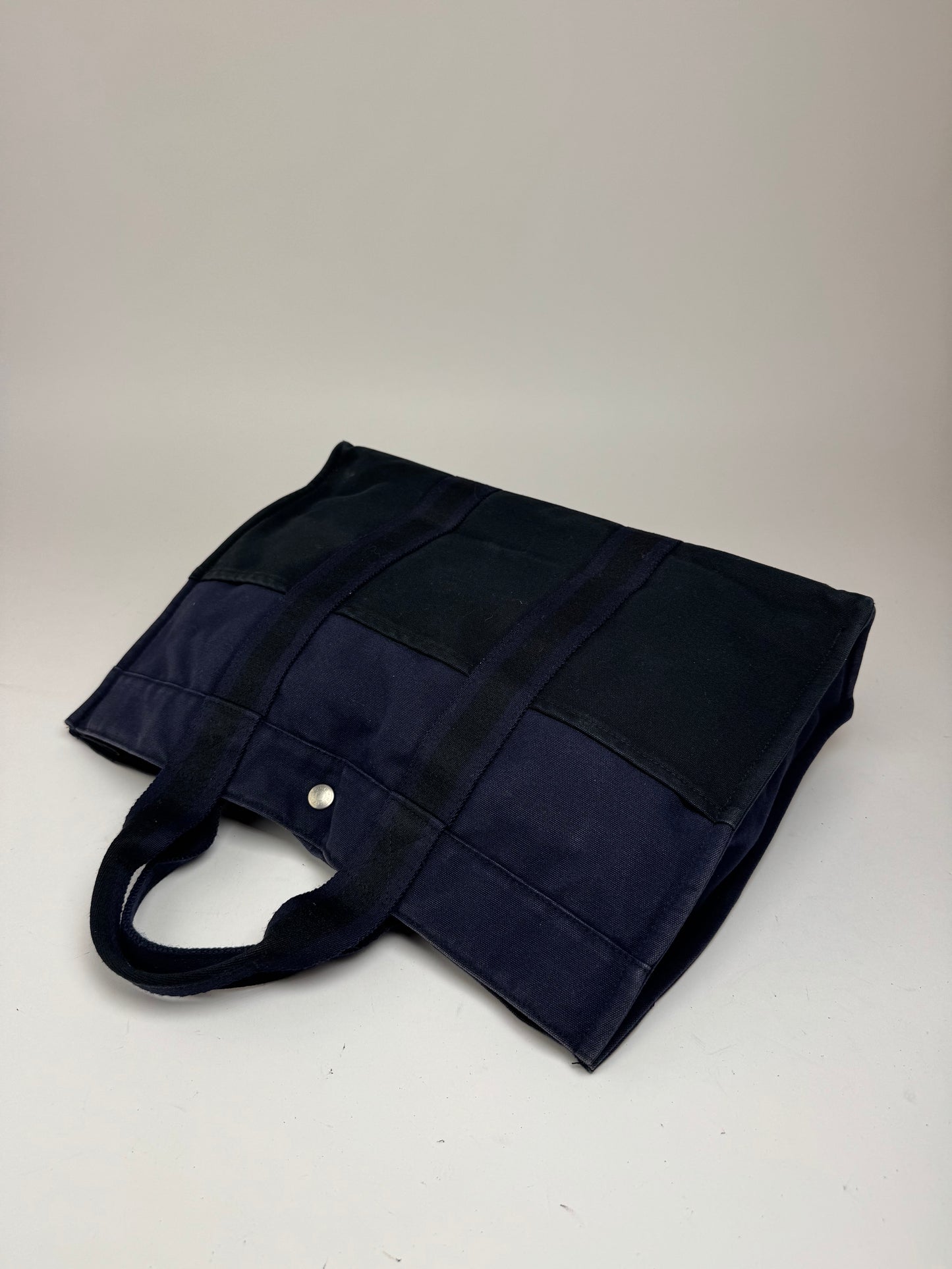 Sac cabas vintage Hermès en toile bleu marine et noir