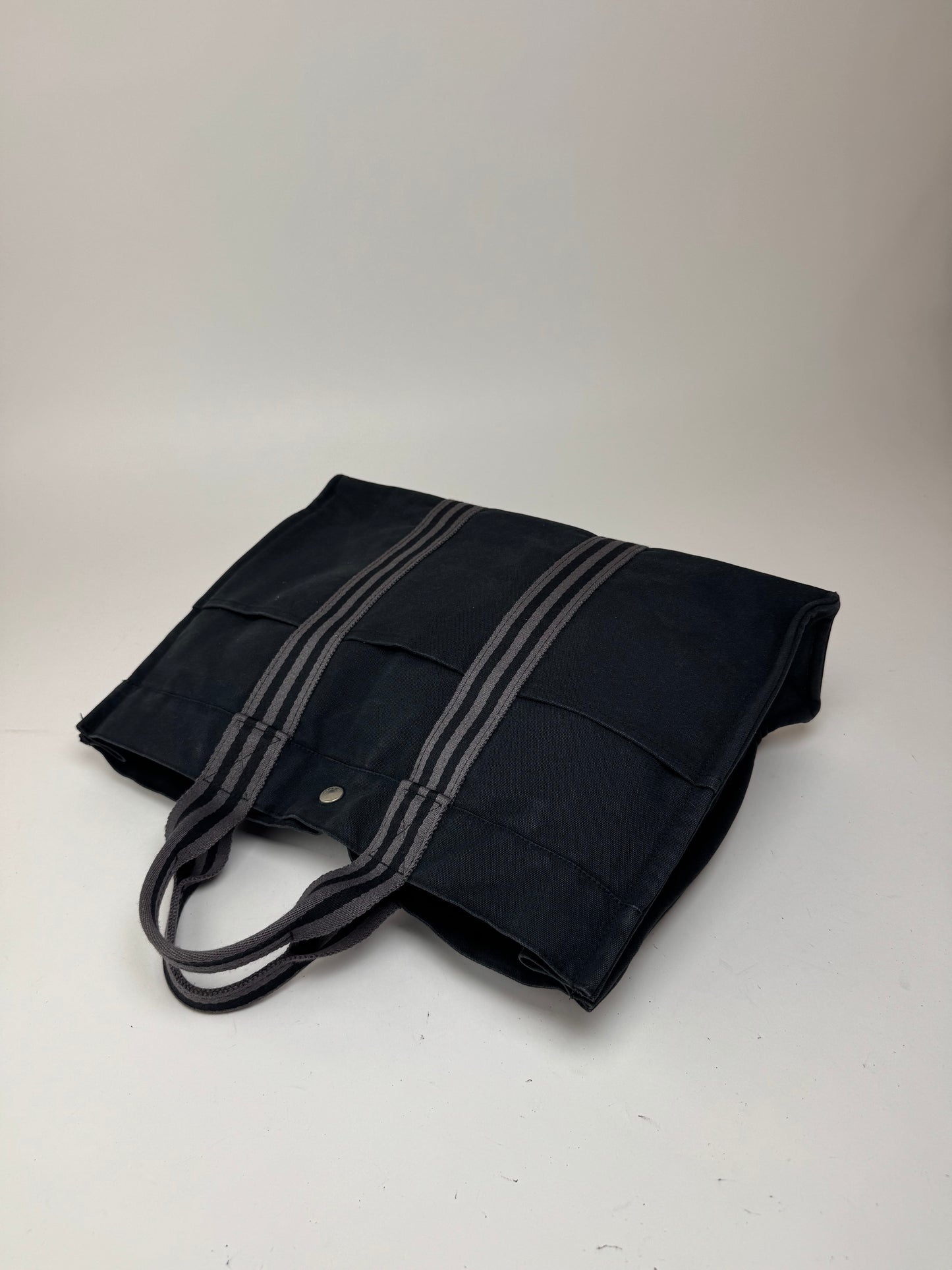 Sac cabas vintage Hermès en toile noire