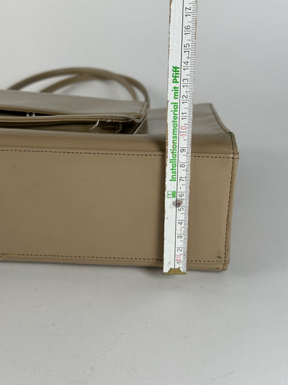 Sac à main vintage Issey Miyake en cuir beige