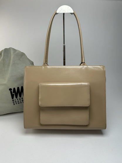 Sac à main vintage Issey Miyake en cuir beige