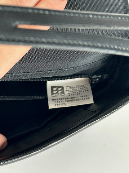 Sac vintage Givenchy en cuir verni noir