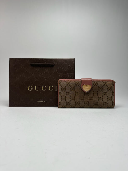 Portefeuille vintage en cuir Gucci Monogram beige rose