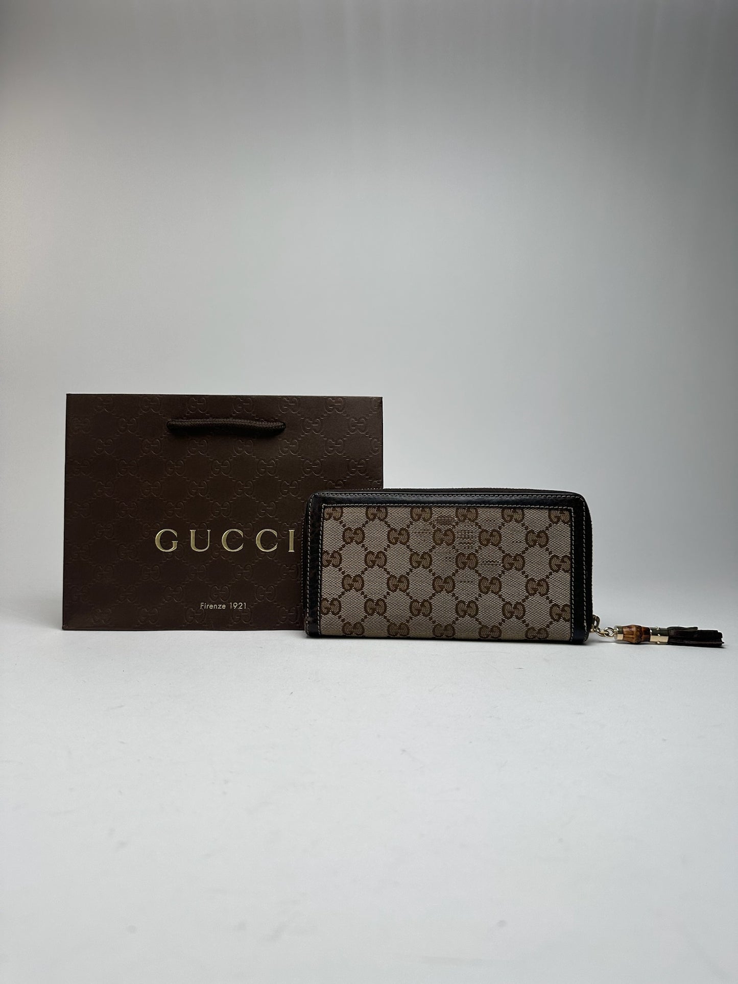 Portefeuille vintage en cuir monogramme Gucci beige marron