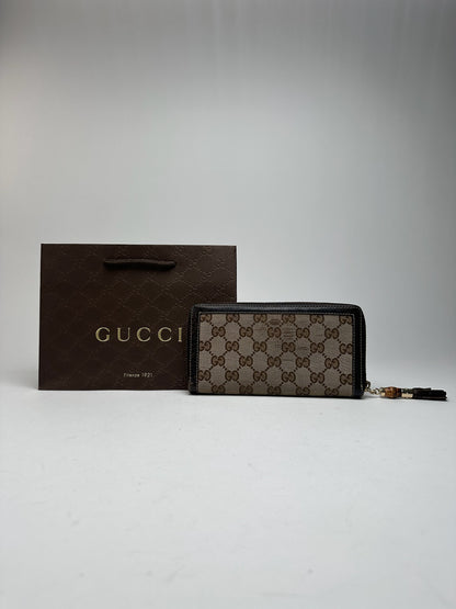 Portefeuille vintage en cuir monogramme Gucci beige marron